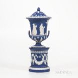 Wedgwood Dark Blue Jasper Dip Vase and Cover on Drum Base, England, 19th century, campana shape with