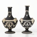 Two Wedgwood Black Jasper Dip Barber Bottles, England, 19th century, each with applied white relief