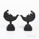 Two Wedgwood Black Basalt Oil Lamps, England, 19th century, oval with fluted neck, oak leaf border a