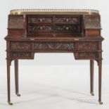 Carlton-style Mahogany Desk, late 19th/early 20th century, with an upper reticulated gallery and aca