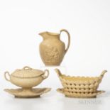 Three Wedgwood Caneware Table Items, England, early 19th century, a leaf-molded covered sauce tureen