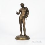 Grand Tour Bronze Figure of a Classical Male Nude, 19th century, the standing figure atop a circular