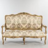 Louis XIV-style Giltwood Settee, late 19th/early 20th century, with carved foliate arabesques to fra