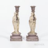 Two Wedgwood Lilac and White Jasper Candlesticks, England, 19th century, each with a maiden holding