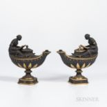 Two Wedgwood Gilded and Bronzed Black Basalt Oil Lamps and Covers, England, c. 1885, each oval, with