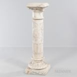 Alabaster Pedestal, gray-veined with a shallow stylized dolphin carving to center, ht. 44, top surfa