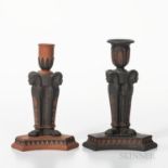 Two Similar Wedgwood Egyptian Candlesticks, England, early 19th century, a rosso antico with black b