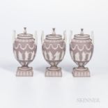 Three Wedgwood Solid Lilac Jasper Vases and Covers, England, c. 1960, each with applied white classi