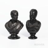 Two Wedgwood Black Basalt Busts, England, 19th century, each mounted atop a waisted circular socle,
