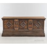 Gothic-style Walnut Chest, with a hinged lid and carved tracery panels, ht. 29 3/4, wd. 69, dp. 22 3