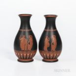 Pair of Davenport Beck & Co. Encaustic Decorated Rosso Antico Vases, England, c. 1875, each with cla
