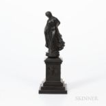 Black Basalt Figure on a Wedgwood Black Basalt Plinth, England, 19th century, standing maiden mounte