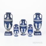 Five Wedgwood Dark Blue Jasper Dip Vases, England, late 19th/early 20th century, each with applied w