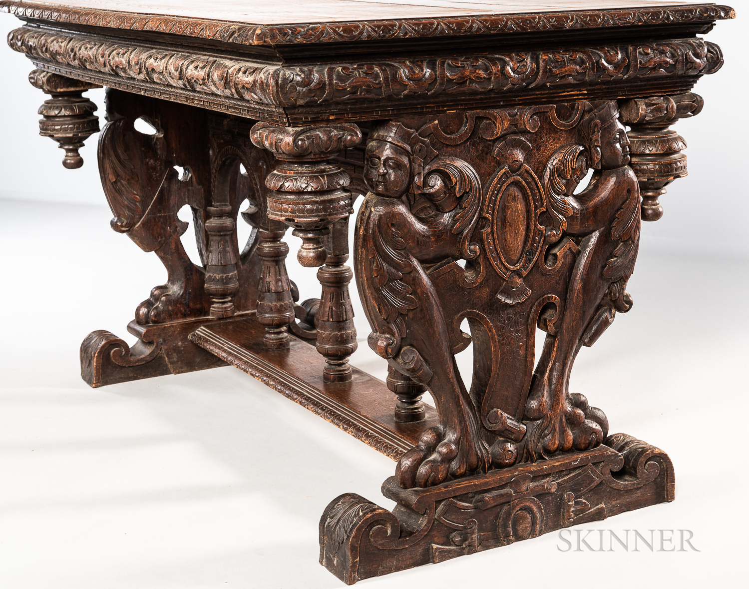 Carved Oak Library Table, late 19th/early 20th century, with figural caryatid trestle supports joine - Image 2 of 2