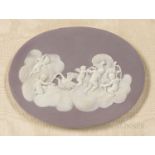 Wedgwood Lilac Jasper Dip Plaque, England, 19th century, oval shape with applied white relief depict