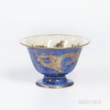 Wedgwood Dragon Lustre Antique Center Bowl, England, c. 1920, gilt dragons to a mottled blue exterio