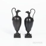 Two Similar Wedgwood & Bentley Black Basalt Oenochoe Ewers, England, c.1775, each mounted atop a squ