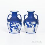 Pair of Wedgwood Dark Blue Jasper Dip Portland Vases, England, 19th century, each with applied white