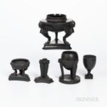Five Black Basalt Items, England, 18th and 19th century, a marked Wedgwood & Bentley cup with classi
