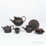 Six Wedgwood Encaustic Basalt Tea Wares, England, late 18th and 19th century, each with iron red and