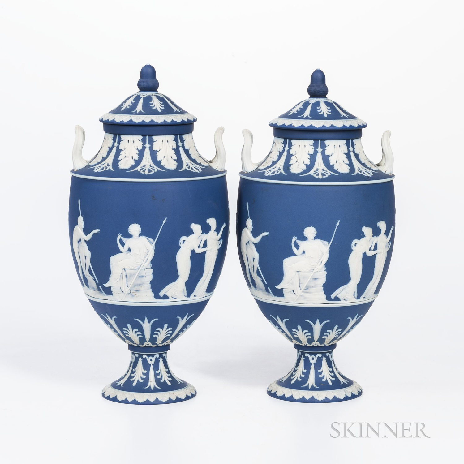 Pair of Wedgwood Dark Blue Jasper Dip Vases and Covers, England, 19th century, each with applied whi
