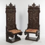 Pair of Renaissance Revival Oak Chairs, late 19th/early 20th century, each with carved acanthine scr
