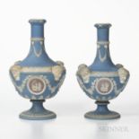 Two Wedgwood Tricolor Jasper Dip Barber Bottles, England, c. 1867, each light blue ground with lilac