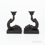 Pair of Wedgwood Black Basalt Dolphin Candlesticks, England, 1974, each mounted atop a raised rectan