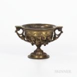 Empire-style Bronze Footed Compote, 19th century, scrolled handles to a bowl adorned with flowers in