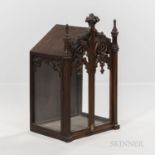 Gothic-style Carved Cabinet, late 19th/early 20th century, glass enclosed to three sides with carved