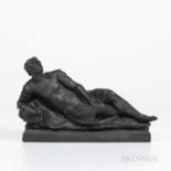 Black Basalt Figure of Mark Antony, England, 19th century, the reclining figure set atop a rectangul