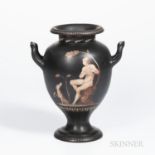 Encaustic Decorated Black Basalt Vase, England, 19th century, upturned loop handles to a bulbous sha