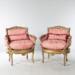 Pair of Louis XVI-style Bergeres, each with a gilded frame and pink silk upholstery, ht. 34, wd. 40,