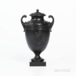 Wedgwood & Bentley Black Basalt Vase and Cover, England, c. 1775, scrolled foliate molded handles wi