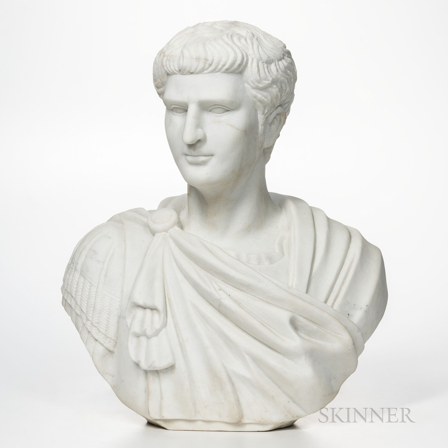 Marble Bust of Caesar, 19th/20th century, typically modeled wearing a cloak, ht. 20 in.