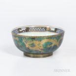 Wedgwood Dragon Lustre Imperial Bowl, England, c. 1920, circular shape with gilt dragons to a mottle