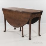 George III Walnut Drop-leaf Table, on turned legs terminating in a pad foot, ht. 28 1/2, wd. 49, dp.