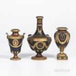 Three Wedgwood Gilded and Bronzed Black Basalt Vases, England, c. 1885, a barber bottle, the neck wi