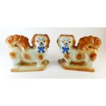 A pair of Staffordshire spaniels with blue ribbons - 19cm
