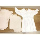 A Victorian white cotton dress with Broderie Anglais bodice and two pink satin slips