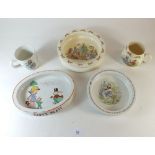 A Doulton Bunnykins baby bowl and mug, a Wedgwood baby bowl and mug and a Shelley baby bowl
