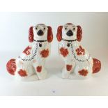 A pair of large Staffordshire spaniels