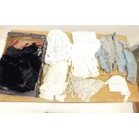 A box of Victorian costume including blouses, blue silk and embroidered jacket, lace etc