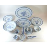 A Chinese blue and white 'Sunflower' dinner service with rice grain border and with original