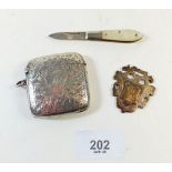 A silver vesta case - Birmingham 1904, a silver and mother of pearl miniature penknife - Sheffield