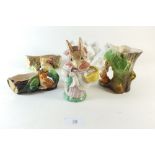 A Royal Albert Beatrix Potter Mrs Rabbit figure, together with three Hornsea and Withernsea animal