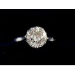 A platinum set solitaire diamond ring - 1.3 carats - size K