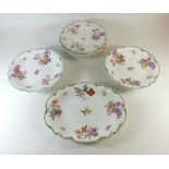A Victorian dessert service painted floral sprays on a white ground comprising oval serving dish,