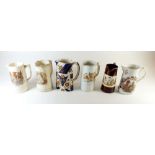 A collection of five Royal Commemorative jugs