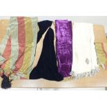 A group of velvet and silk stoles